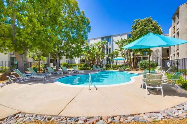 6930 Hyde Park Dr Unit 218, San Diego, CA 92119 - community pool featuring a patio area