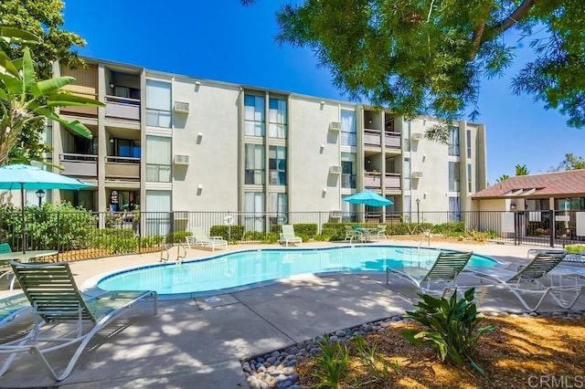 6930 Hyde Park Dr Unit 218, San Diego, CA 92119 - community pool with a patio area