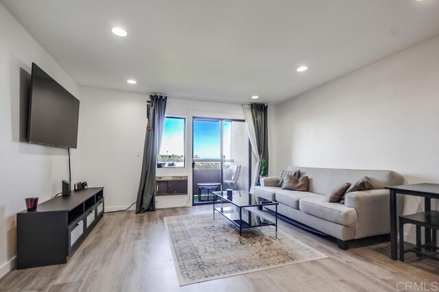 6930 Hyde Park Dr Unit 218, San Diego, CA 92119 - living area featuring light wood-style flooring and recessed lighting