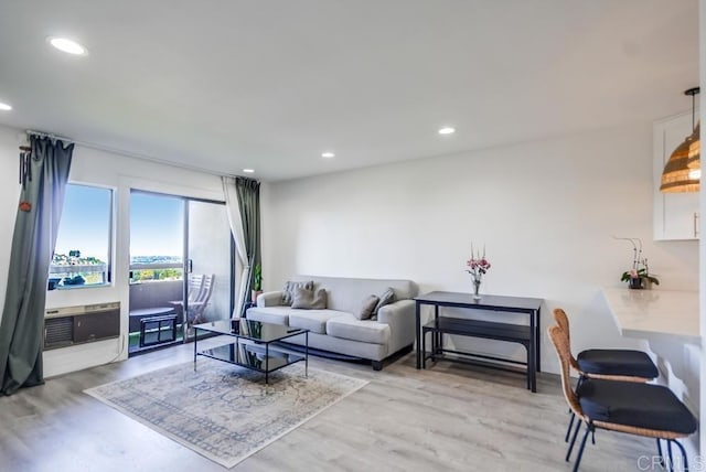 6930 Hyde Park Dr Unit 218, San Diego, CA 92119 - living area featuring light wood finished floors and recessed lighting