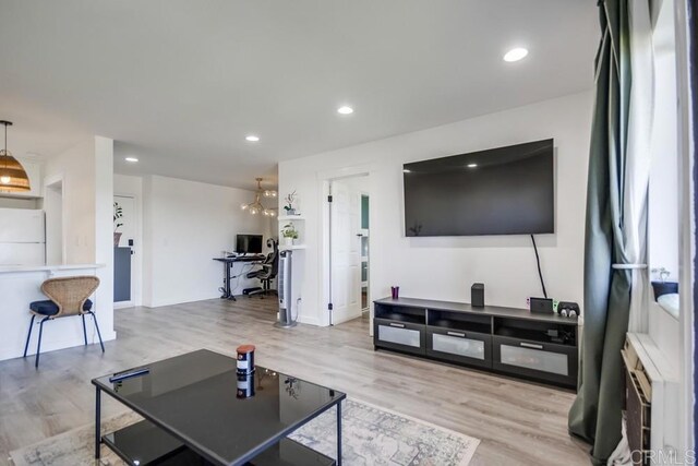 6930 Hyde Park Dr Unit 218, San Diego, CA 92119 - living room with wood finished floors, recessed lighting, baseboards, and an office area