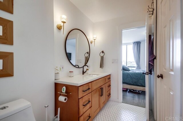 6930 Hyde Park Dr Unit 218, San Diego, CA 92119 - bathroom featuring vanity, toilet, and connected bathroom