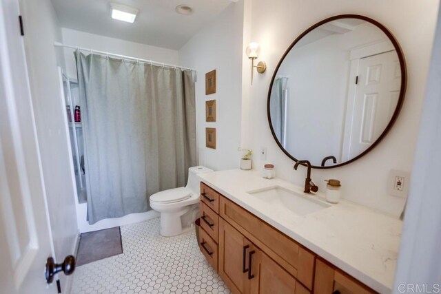 6930 Hyde Park Dr Unit 218, San Diego, CA 92119 - bathroom featuring vanity, toilet, and shower / bath combo