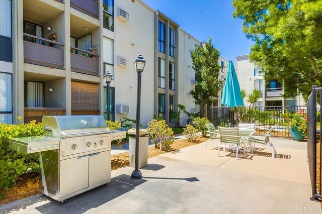 6930 Hyde Park Dr Unit 218, San Diego, CA 92119 - view of patio with outdoor dining area and area for grilling