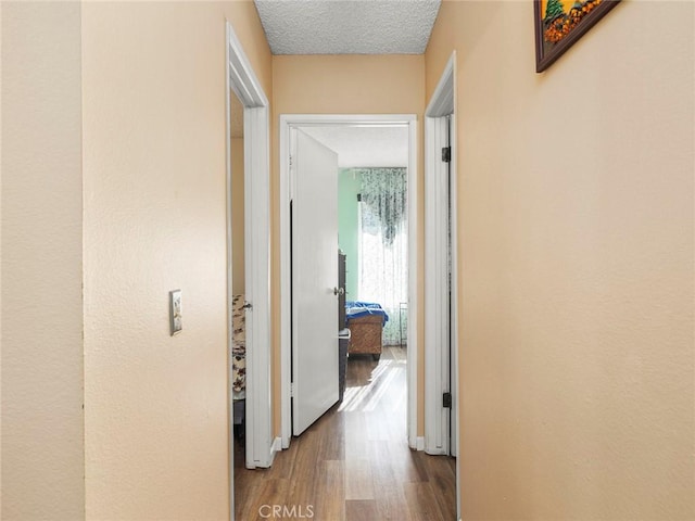 3038 Blakeman Ave, Rowland Heights, CA 91748 - hallway with wood finished floors and a textured ceiling
