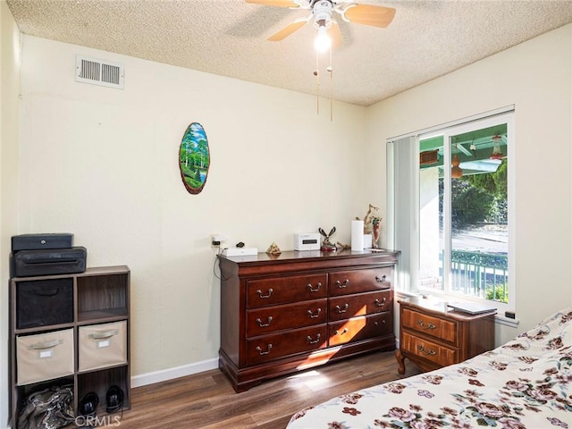 3038 Blakeman Ave, Rowland Heights, CA 91748 - bedroom featuring dark wood-style flooring, a textured ceiling, baseboards, and ceiling fan