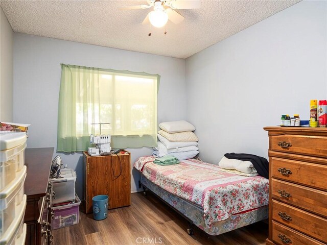 3038 Blakeman Ave, Rowland Heights, CA 91748 - bedroom with wood finished floors, a textured ceiling, and a ceiling fan