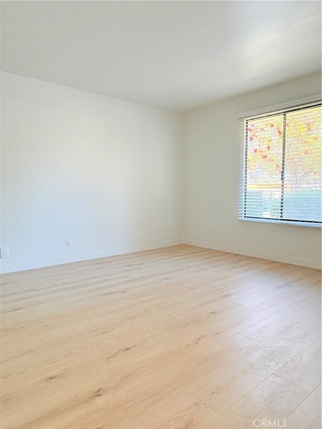 3088 Via Serena N Unit D, Laguna Woods, CA 92637 - unfurnished room featuring light wood-type flooring and baseboards