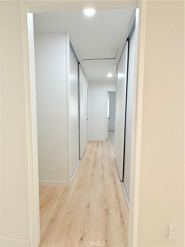 3088 Via Serena N Unit D, Laguna Woods, CA 92637 - hallway featuring light wood-type flooring, baseboards, and recessed lighting
