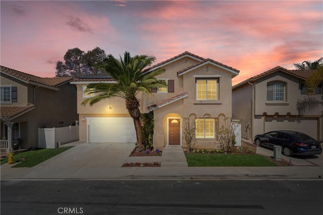 7 Monticello Ln, Rancho Santa Margarita, CA 92688 - mediterranean / spanish-style house with concrete driveway, stucco siding, solar panels, and a tile roof