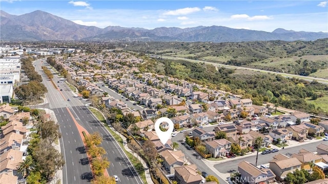 7 Monticello Ln, Rancho Santa Margarita, CA 92688 - aerial perspective of suburban area with a mountain backdrop