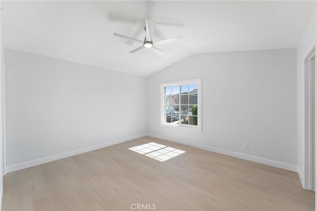 7 Monticello Ln, Rancho Santa Margarita, CA 92688 - spare room with ceiling fan, light wood-style flooring, lofted ceiling, and baseboards