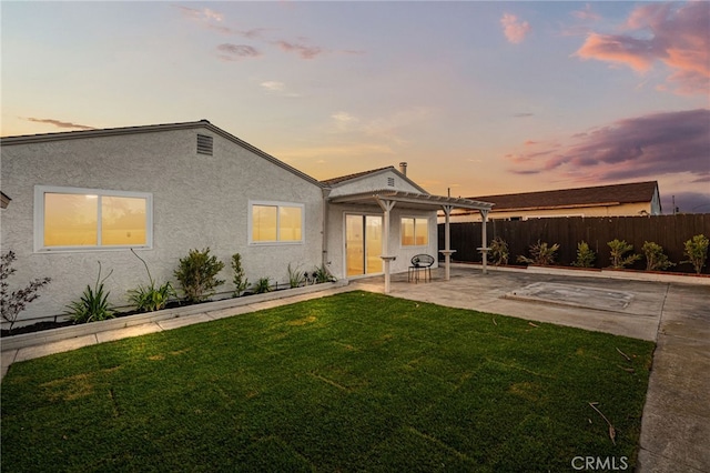 1086 Amacayo Ct, San Diego, CA 92154 - back of property at dusk featuring a pergola, a patio area, and stucco siding