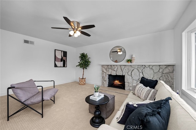 1086 Amacayo Ct, San Diego, CA 92154 - carpeted living room with a fireplace, a ceiling fan, and baseboards