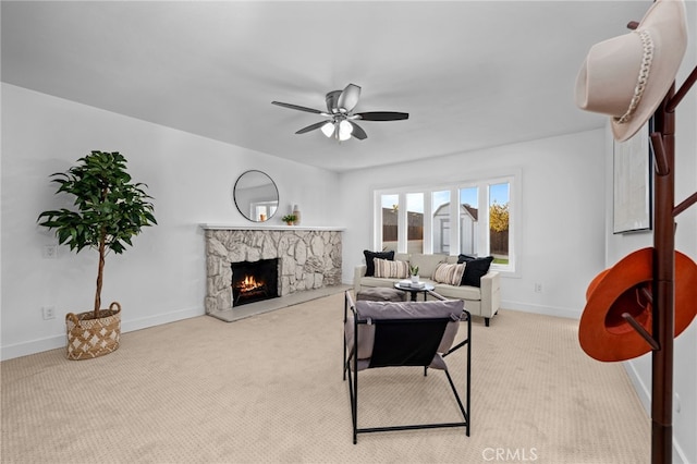 1086 Amacayo Ct, San Diego, CA 92154 - carpeted living room featuring a ceiling fan, baseboards, and a fireplace