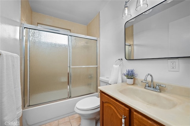 1086 Amacayo Ct, San Diego, CA 92154 - bathroom with toilet, vanity, tile patterned floors, and combined bath / shower with glass door