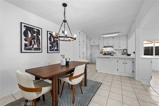 1086 Amacayo Ct, San Diego, CA 92154 - dining room featuring a chandelier and light tile patterned floors