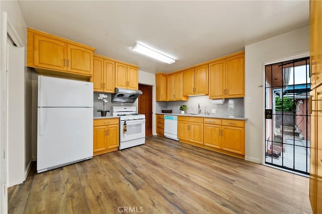 2034 W 165th St, Torrance, CA 90504 - kitchen with white appliances, a sink, light countertops, and decorative backsplash