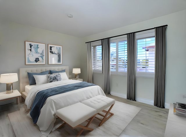 6808 Hyde Park Dr, San Diego, CA 92119 - bedroom with baseboards and light wood-type flooring