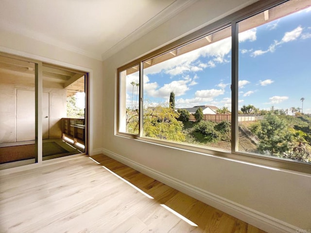 6808 Hyde Park Dr, San Diego, CA 92119 - unfurnished sunroom with baseboards, crown molding, and wood finished floors