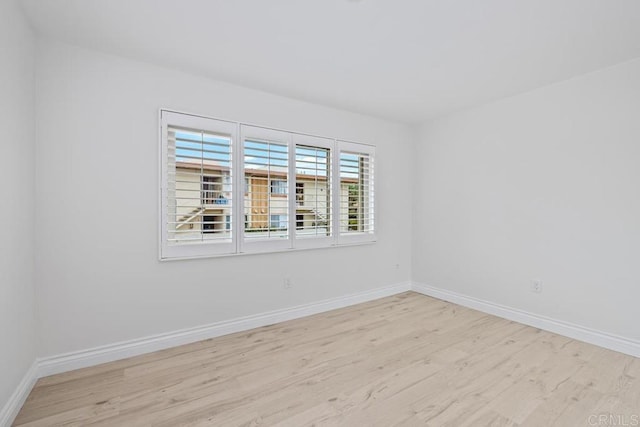 6808 Hyde Park Dr, San Diego, CA 92119 - unfurnished room featuring wood finished floors and baseboards
