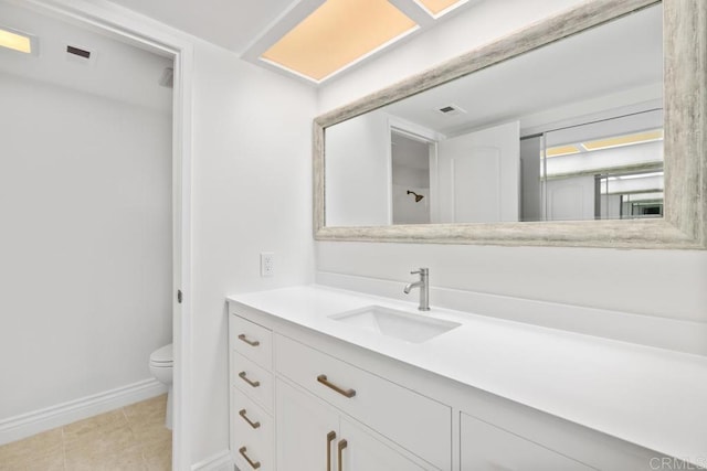 6808 Hyde Park Dr, San Diego, CA 92119 - bathroom with toilet, vanity, baseboards, and tile patterned flooring