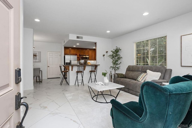 5529 Old Ranch Rd Unit 47, Oceanside, CA 92057 - living room featuring light marble finish floors and recessed lighting