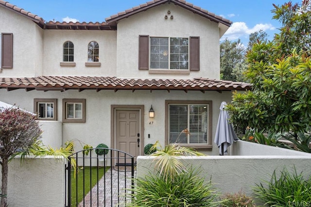 5529 Old Ranch Rd Unit 47, Oceanside, CA 92057 - mediterranean / spanish-style house with stucco siding and a tiled roof