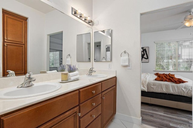 5529 Old Ranch Rd Unit 47, Oceanside, CA 92057 - full bathroom featuring connected bathroom, double vanity, plenty of natural light, and a ceiling fan