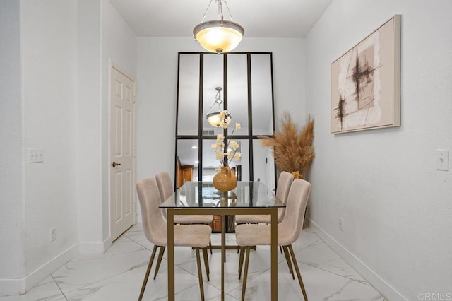 5529 Old Ranch Rd Unit 47, Oceanside, CA 92057 - dining space with light marble finish flooring and baseboards