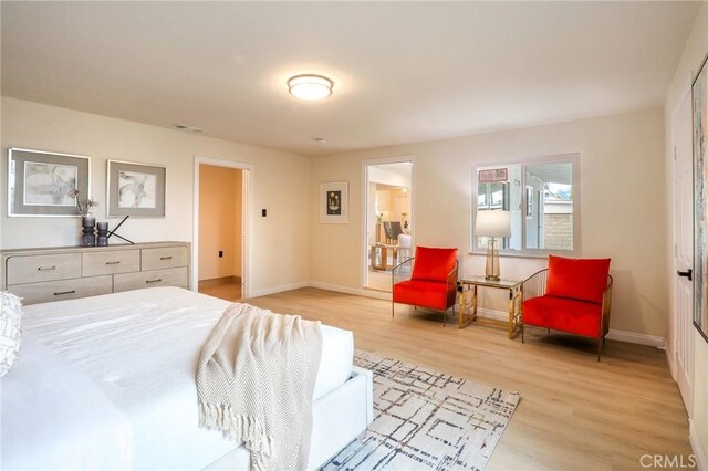 18479 Aguiro St, Rowland Heights, CA 91748 - bedroom with light wood-style flooring and baseboards