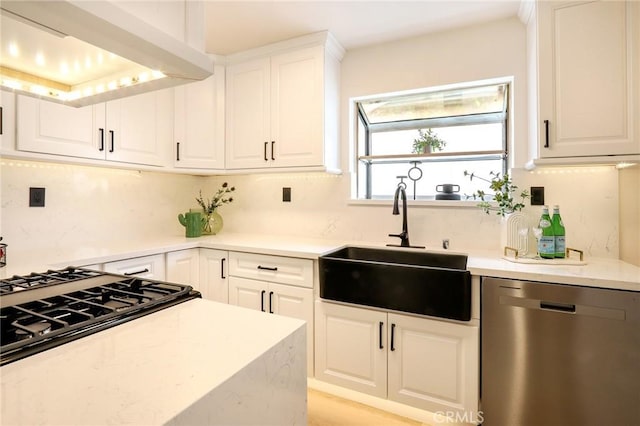 18479 Aguiro St, Rowland Heights, CA 91748 - kitchen featuring dishwasher, a sink, extractor fan, and white cabinetry