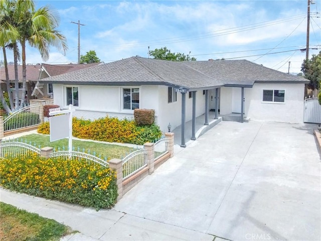 18479 Aguiro St, Rowland Heights, CA 91748 - ranch-style home featuring a gate, stucco siding, roof with shingles, concrete driveway, and a fenced front yard