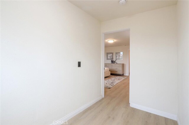 18479 Aguiro St, Rowland Heights, CA 91748 - hall featuring light wood-type flooring and baseboards