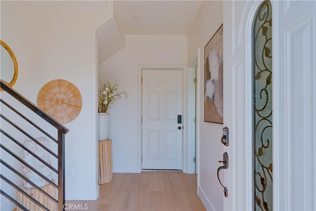 712 N Chestnut Ave, Los Angeles, CA 90042 - entryway featuring light wood-type flooring and baseboards