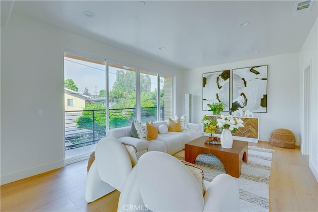 712 N Chestnut Ave, Los Angeles, CA 90042 - living area with light wood-style floors and baseboards