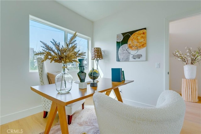 712 N Chestnut Ave, Los Angeles, CA 90042 - home office featuring wood finished floors, healthy amount of natural light, and baseboards