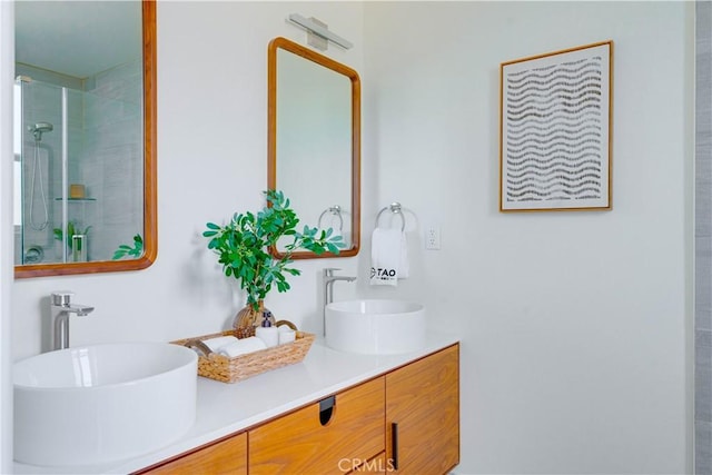 712 N Chestnut Ave, Los Angeles, CA 90042 - full bathroom featuring double vanity and tiled shower