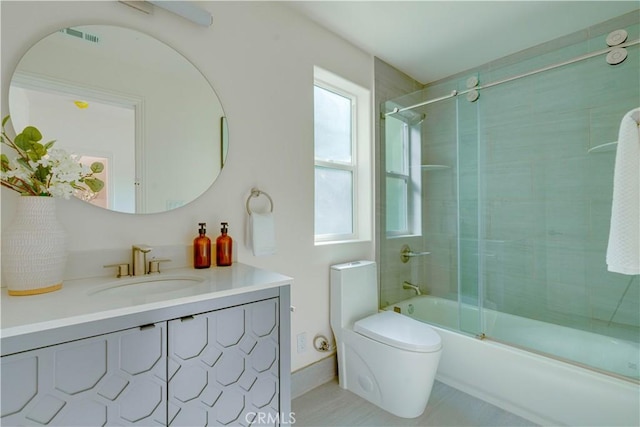 712 N Chestnut Ave, Los Angeles, CA 90042 - bathroom with vanity, combined bath / shower with glass door, toilet, and tile patterned floors