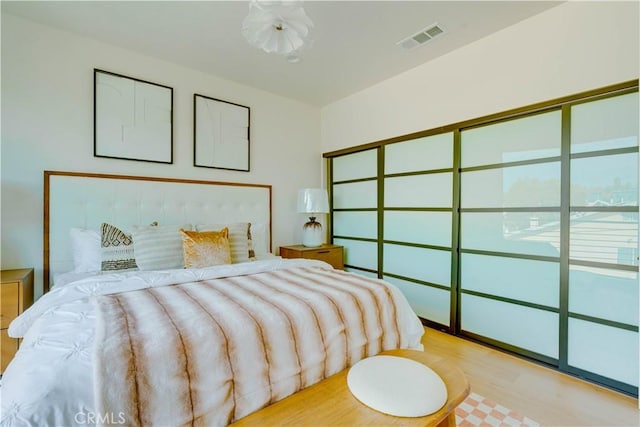 712 N Chestnut Ave, Los Angeles, CA 90042 - bedroom with wood finished floors