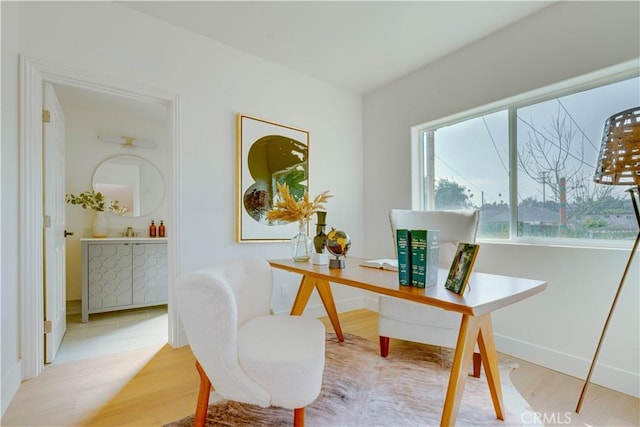 712 N Chestnut Ave, Los Angeles, CA 90042 - home office with wood finished floors and baseboards