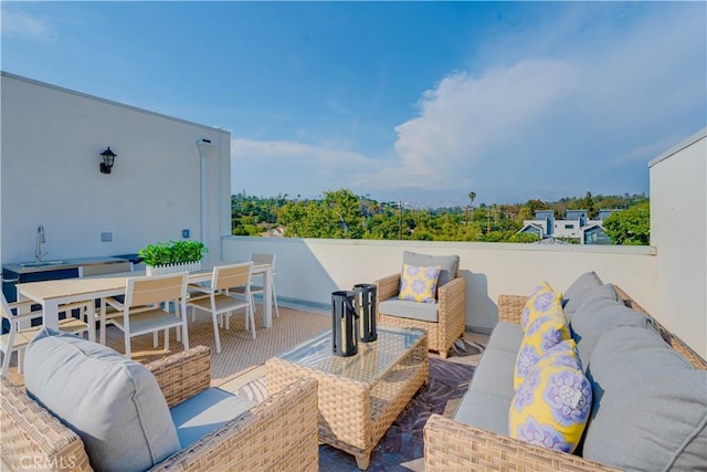 712 N Chestnut Ave, Los Angeles, CA 90042 - view of patio with an outdoor living space, a sink, and outdoor dining space