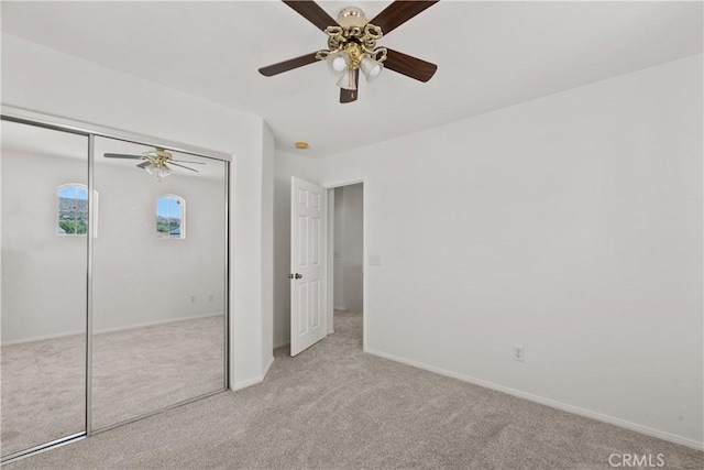 4349 Bethpage Dr, Palmdale, CA 93551 - unfurnished bedroom with carpet, baseboards, a closet, and a ceiling fan