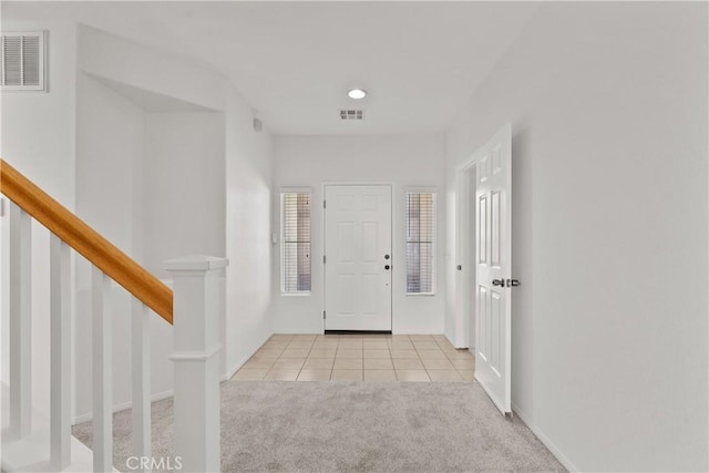 4349 Bethpage Dr, Palmdale, CA 93551 - carpeted entryway with tile patterned flooring, stairs, recessed lighting, and baseboards