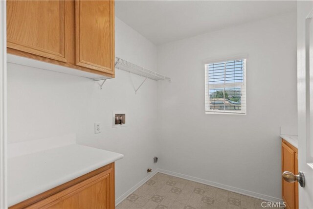 4349 Bethpage Dr, Palmdale, CA 93551 - laundry room with cabinet space, hookup for a washing machine, baseboards, and light floors