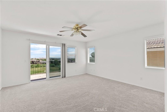 4349 Bethpage Dr, Palmdale, CA 93551 - unfurnished room with ceiling fan, light colored carpet, and baseboards