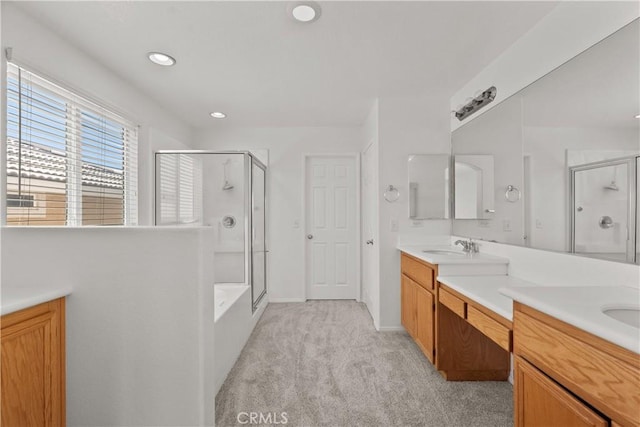4349 Bethpage Dr, Palmdale, CA 93551 - bathroom featuring a shower stall, vanity, recessed lighting, a bathtub, and baseboards