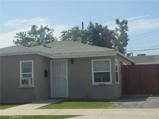 2706 E 57th St, Long Beach, CA 90805 - view of front of property with roof with shingles and stucco siding