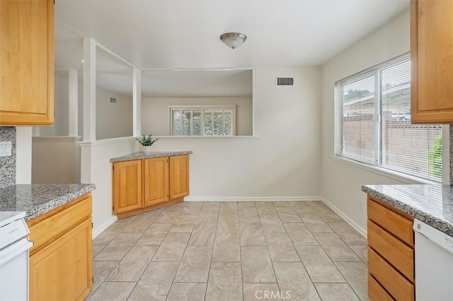 27129 Elias Ave, Saugus, CA 91350 - kitchen featuring dishwasher, healthy amount of natural light, tasteful backsplash, and baseboards