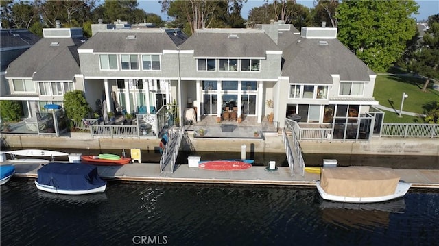 16413 Wimbledon Ln, Huntington Beach, CA 92649 - back of house featuring a water view and a shingled roof